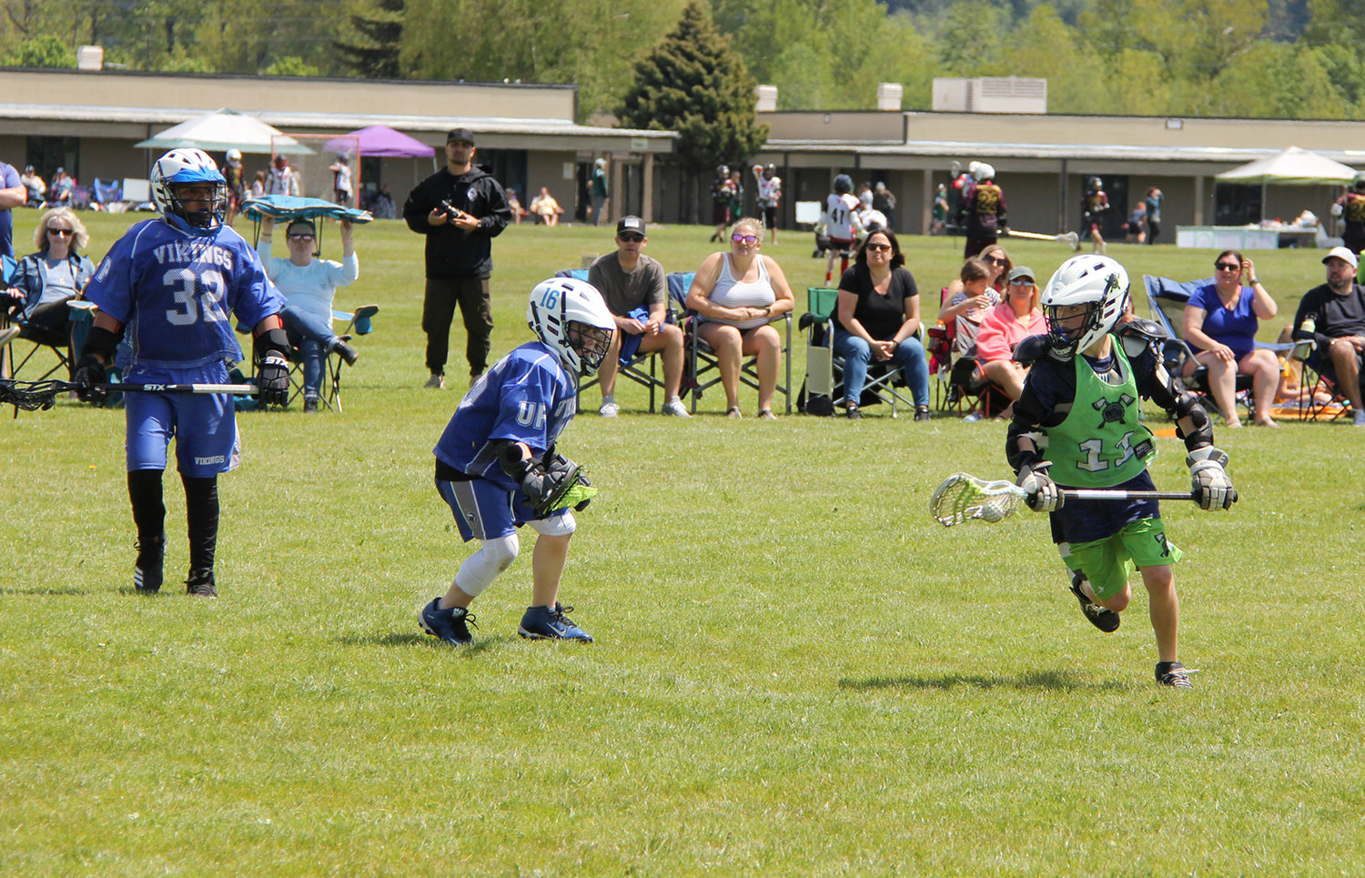 Courtesy Photo.Twin Cities Lacrosse's Easton Buck runs upfield over the weekend during the South Sound Youth Lacrosse Tournament.